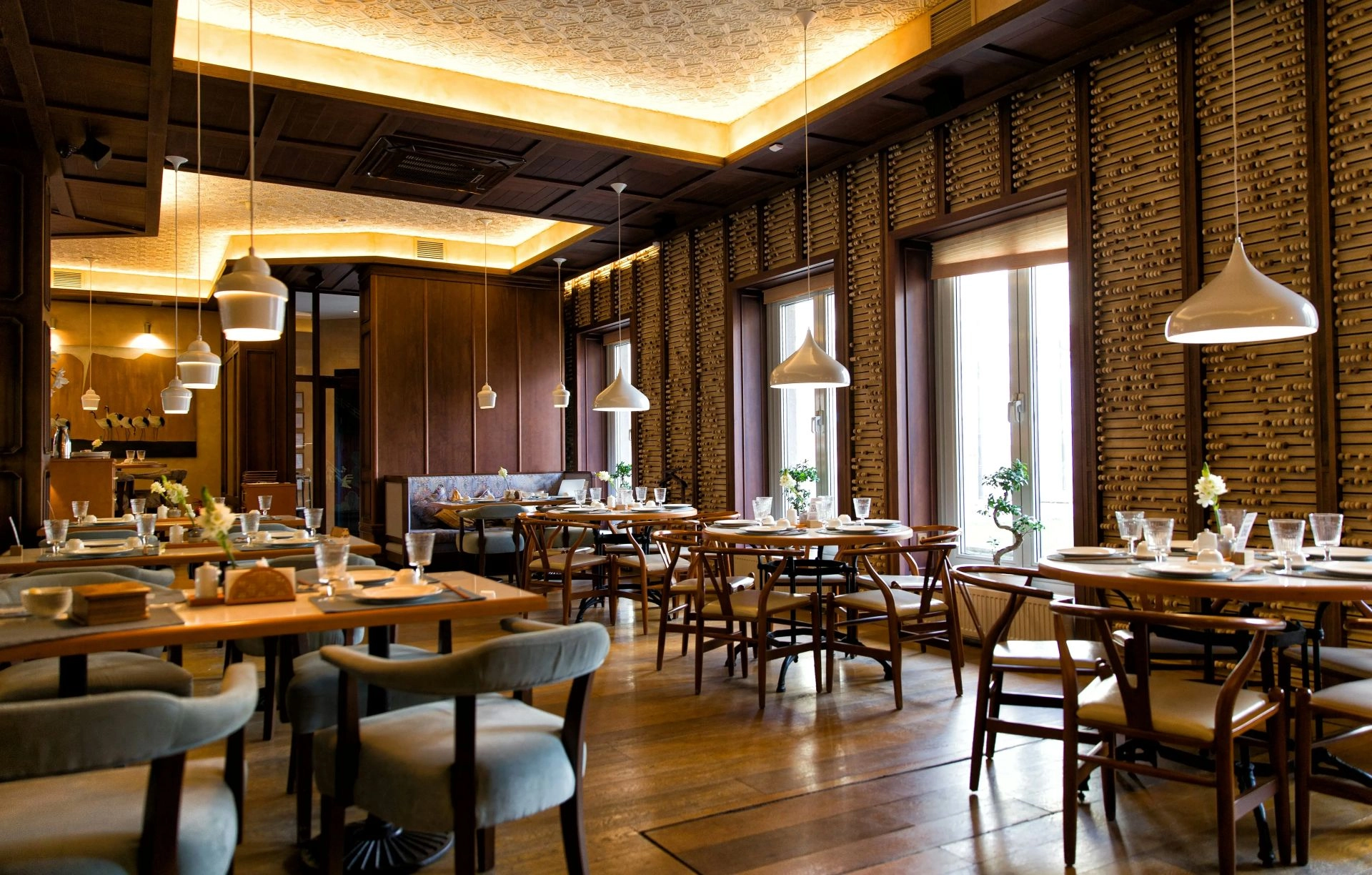 Lounge ambience with warm lighting and staff serving